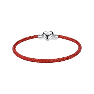 Braided red cord bracelet featuring a polished silver heart-shaped clasp on a white background