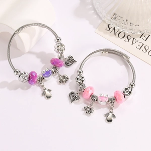 Beaded charm bracelet set with cute heart and elephant pendants on woven metal bands