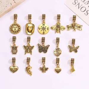 Set aus 15 Vintage-Gold-Anhängern für DIY-Barockschmuck mit Sonnen- und Tiermotiven