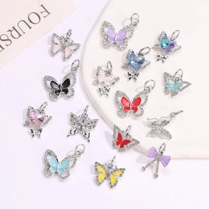 Set van 13 kleurrijke vlinderhangers met kristallen voor DIY-sieraden maken