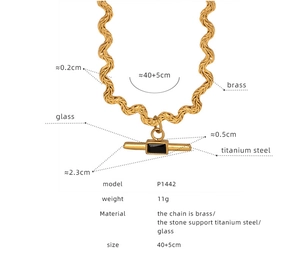 Detail of wavy gold chain necklace with black glass stone pendant and dimensions