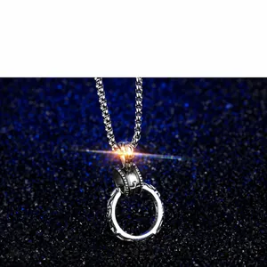 Detailed close-up of retro silver steel necklace featuring cross pendant and square chain