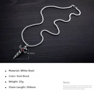 Macro view of sword pendant with eagle design and red gemstone in white steel finish