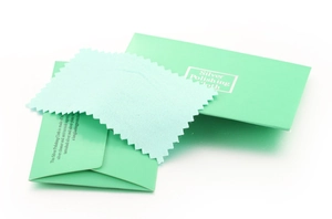 Silver polishing cloth set with soft blue cleaning fabric and mint green packaging sleeves