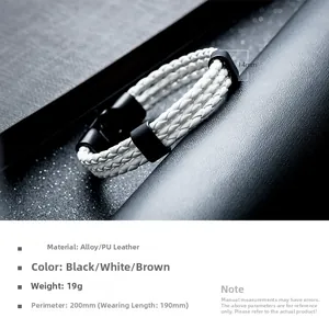 Detailed view of layered white braided leather bracelet with black alloy buckle clasp