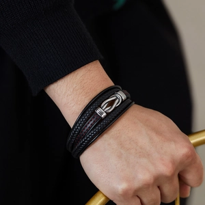 Men's multilayer braided black leather bracelet with silver buckle and red stitching detail