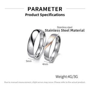 Macro detail of couple rings with love engraving and a matching heart design in steel