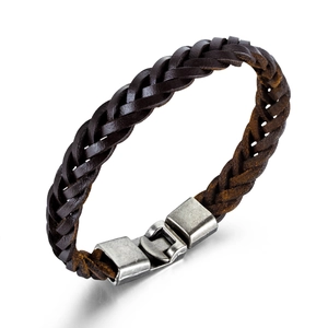Retro hand-woven dark brown leather bracelet with brushed metal clasp on white background