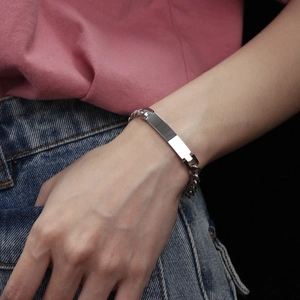 Sleek silver stainless steel Cuban chain bracelet with rectangular engravable ID tag for unisex