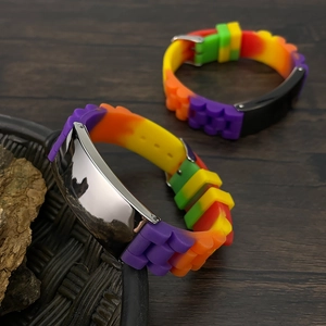 Rainbow silicone sports bracelet with stainless steel ID plate and textured band