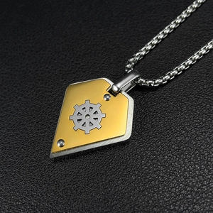 Macro detail of retro shield pendant with silver rudder on black leather background