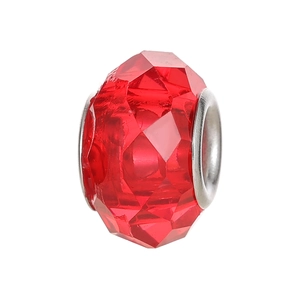 Detailed close-up of a faceted red resin charm bead with silver metal core for DIY jewelry