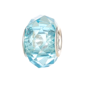 Close-up of light blue faceted resin charm bead with silver metal core for DIY jewelry