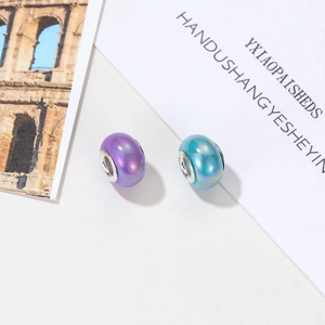 DIY iridescent resin beads for necklaces and bracelets featuring metallic finish and silver core