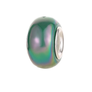 Macro detail of iridescent dark green resin charm bead with a silver metal core