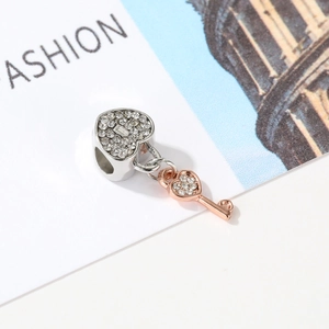 S925 sterling silver heart lock and key charm with sparkling cubic zirconia stones