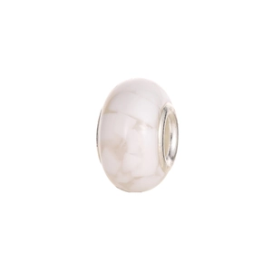 Macro view of mosaic-pattern charm bead with silver metal core on white background