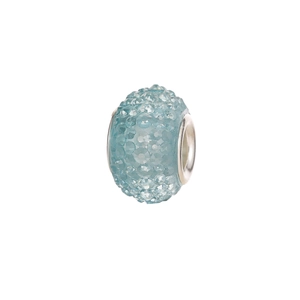 Macro shot of light blue faceted resin charm bead with a silver metal core insert