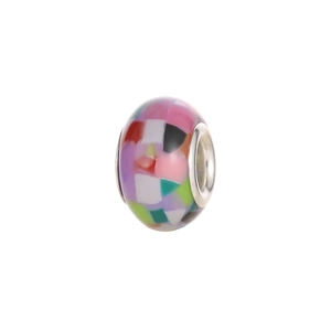 Close-up of colorful resin mosaic bead with silver metal core for DIY jewelry making