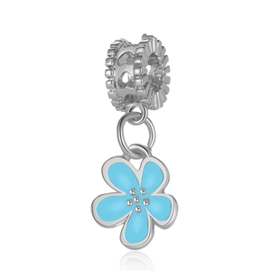 Detail of light blue cherry blossom pendant with heart engraved slide charm