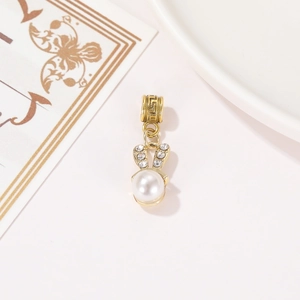 Golden bunny pendant with sparkling crystals and pearl detail for Easter jewelry making