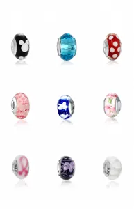 Macro shot of assorted Murano glass charms with 925 silver core for DIY bracelet