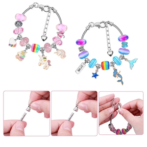 DIY charm bracelet set featuring unicorn and mermaid pendants with colorful beads