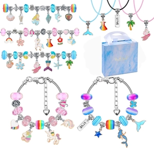 Detail view of 78-piece kids mermaid unicorn DIY bead kit with gift box and charms