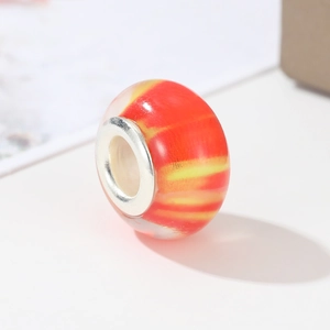 Cartoon red resin DIY bead with orange swirl patterns and silver core for jewelry making