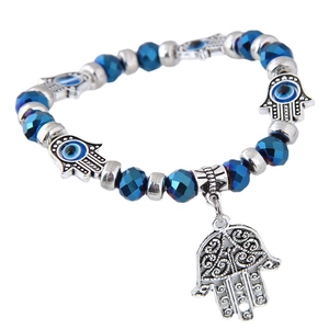 Etnische armband met blauwe kristallen kralen, Hamsa Hand en boze oog bedeltjes