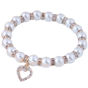 Elegant beaded pearl bracelet with gold rhinestone spacers and heart pendant
