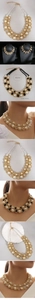 Détail du collier de perles enveloppées de fil avec la chaîne d'extension de 5 cm