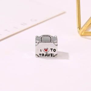 I Love To Travel silver suitcase charm bead for bracelets with red heart detail