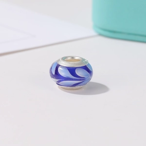 Blue glass bead charm with white wave pattern and S925 silver core for DIY jewelry