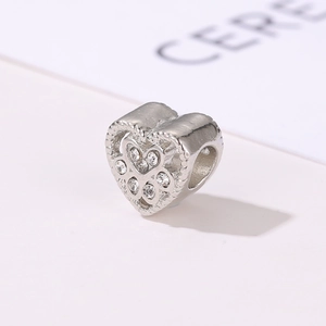 DIY heart-shaped silver charm with hollow design and sparkling zircon for pet jewelry