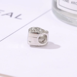 Silver heart-shaped bead charm with clear crystals and vintage texture for DIY jewelry