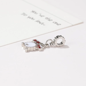 Cartoon bunny charm pendant for bracelets featuring red and white enamel on silver metal