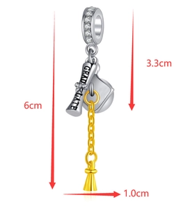 Detailed view of graduate charm with measurements of 6cm length and golden tassel