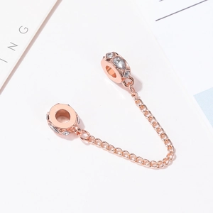 Catena di sicurezza oro rosa per bracciali con zirconi marquise e tondi scintillanti