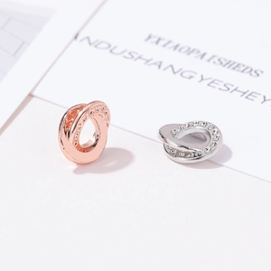 Elegantes cuentas espaciadoras en espiral en oro rosa y plata para joyería DIY
