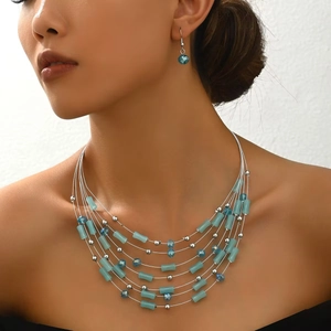 Bohemian multi-layer beaded necklace and earrings set with light blue crystal beads