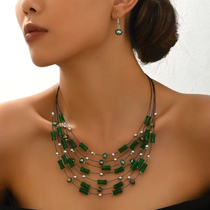 Bohemian multi-layer green beaded necklace and earring set with crystal and bamboo accents