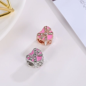 Pink heart bow charms with white crystals and rose gold base for DIY bracelets