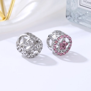 Cilindrische sterbedeltjes met pavé-gezette strass in zilver en roze voor DIY-armbanden