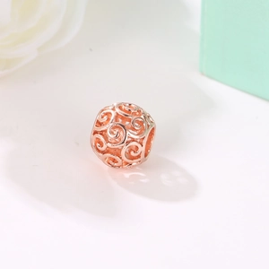 Cuenta hueca de filigrana en oro rosa con patrón de nubes para hacer joyas DIY