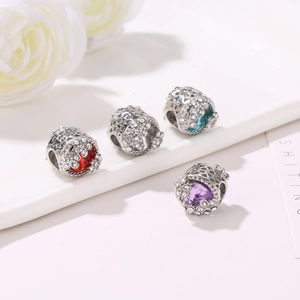Perles fleur de cerisier en alliage argenté avec motif floral creux et cristaux