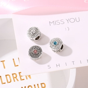 Macro di charm in argento con pietre scintillanti trasparenti, rosa e blu acqua
