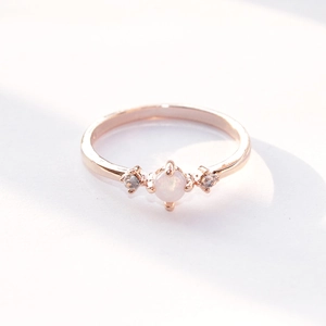 Elegant rose gold opal engagement ring with micro-set zircon accents for women