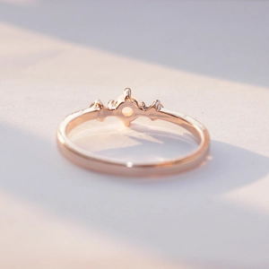 Rose gold opal ring with round center stone and micro-pave accents for women