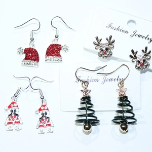 Sparkling Christmas earring set with reindeer, snowflake, and star tree designs